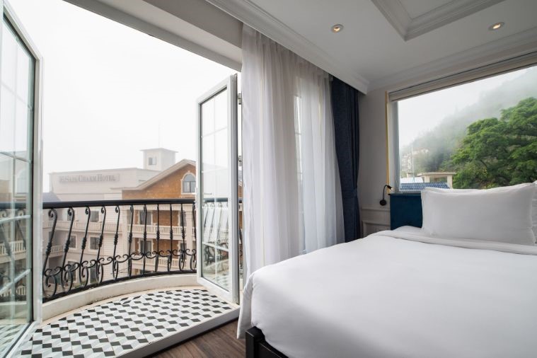 Family Connecting With Balcony